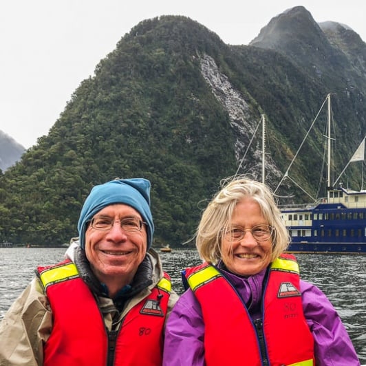 Couple on the boat at Milford Sound, Fiordland New Zealand