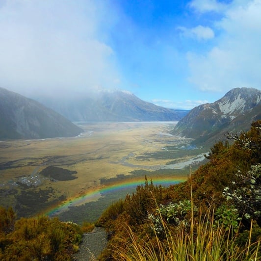 Rainbows in the clouds up at Aoraki/Mt Cook National Park. This is the view down the Tasman valley back towards the...