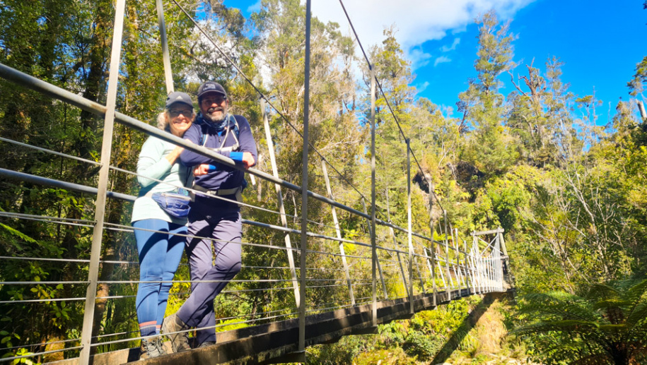10. Guest couple on bridge Pororari River Track