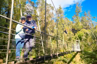10. Guest couple on bridge Pororari River Track