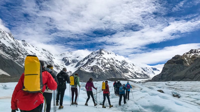 12 guests hiking on tasman glacier