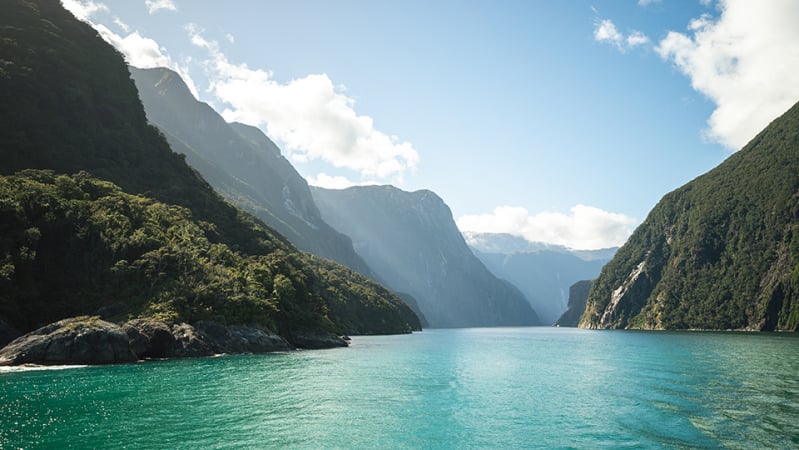 waterfall valley new zealand steep torrent group mountain blue