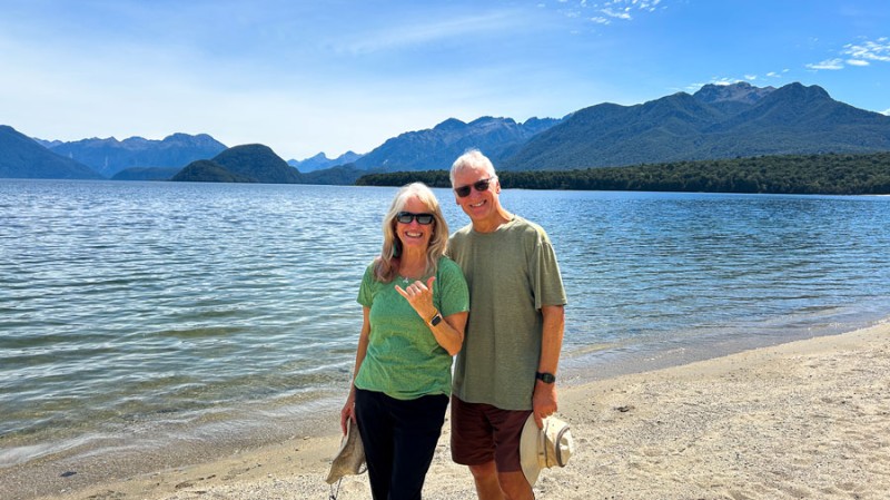 happy couple by the lake kepler track
