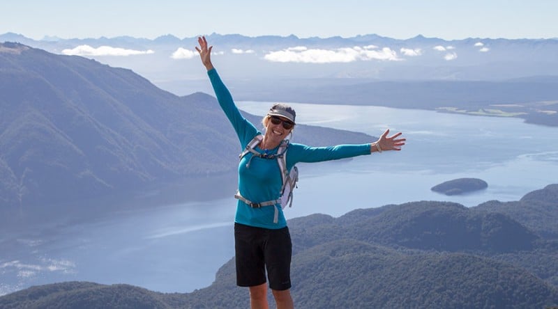 happy solo traveller hiking kepler track blog content