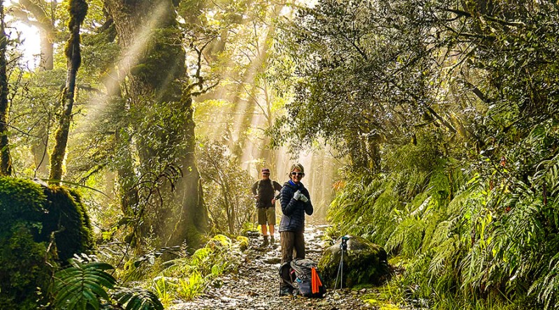 two guests hiking fiordland national park blog content