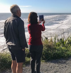 Couple at Meybille Bay, West Coast New Zealand