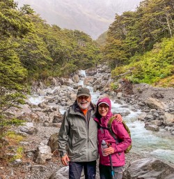 Couple at the river, at Arthurs Pass National Park, Canterbury New Zealand