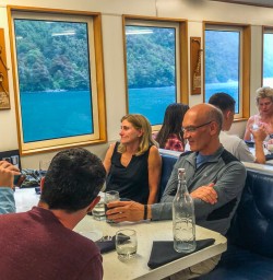 Drink on the boat at Milford Sound, Fiordland New Zealand