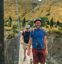 Guests biking through Arrowtown