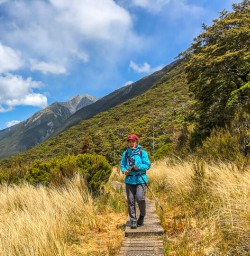 Lady walking at at Arthurs Pass National Park, Canterbury New Zealand