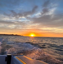 Sunset in Kaikoura on boat