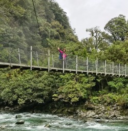Crossing Hidden Falls Creek, Fiordland National Park Southland New Zealand