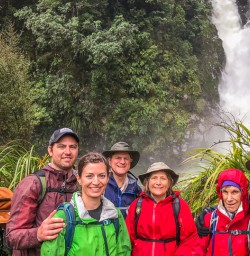 Group at Hidden Falls, Hollyford Track, Fiordland National Park Southland New Zealand