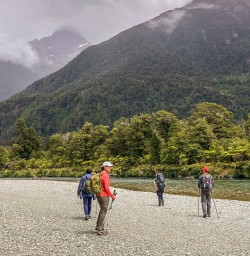 Group at Hollyford river, Fiordland New Zealand