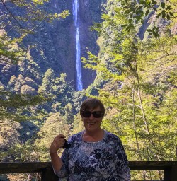 Guest at Hollyford track falls, Fiordland New Zealand