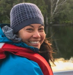Guest on Jetboat at Lake Mckerrow, Fiordland New Zealand