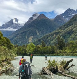 Hiking next to river Hollyford track
