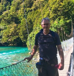 Nicely executed one-handed crossing of the Hollyford!