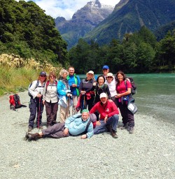 hiking group on the hollyford track new zealand