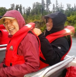 big smiles on the hollyford river jetboat