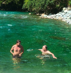 Colling off with a refreshing dip in a swimming hole. Hollyford Valley New Zealand