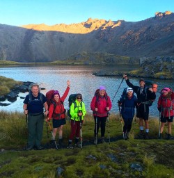 The team celebrating their arrival at Angelus Hut