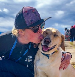 Dog kisses up Mount Iron