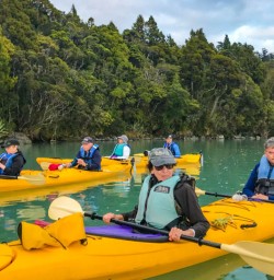 Group kayak on Okarito lagoon