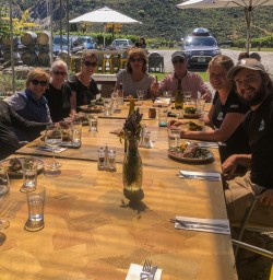 Group having lunch at Kinross wineyard wineyards, Gibbston Otago New Zealand
