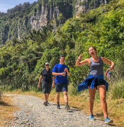Happy hikers at Porarari river, Paparoa National Park West Coast New Zealand