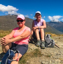 Pair sitting up Rocky Mountain