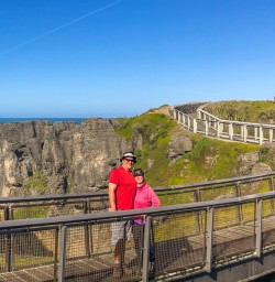 Couple at Punakaiki pancake rocks, West Coast New Zealand