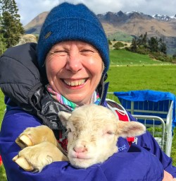 Guest and lamb at queenstown farm