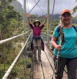 Happy ladies on the bridge at Porarari river, Paparoa National Park West Coast New Zealand