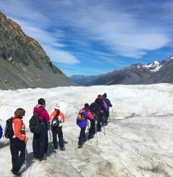 Crampons on and follow the leader across the impressive Tasman Glacier.