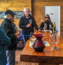 Wine tasting at Kinross wineyards, Gibbston Otago New Zealand