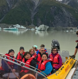 Boarding into the boat at Tasman Lake, Canterbury New Zealand