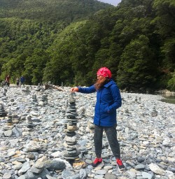 How high can you go? Building cairns at Fantail Falls