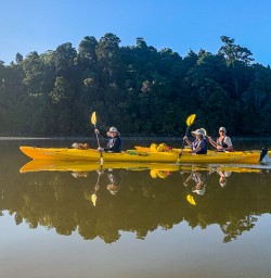 Kayak tour at Okarito lagoon, West Coast New Zealand