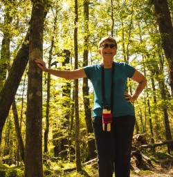 14 Judith Cox leans on a tree