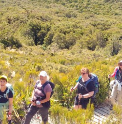 1. Four happy guests on Routeburn Track