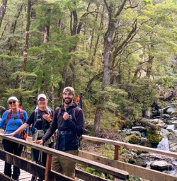 1. Guide Ryan and guests on bridge Routeburn Track