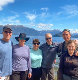 1. Happy guests group photo at Lake Manapouri