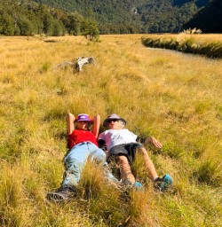 1. Relaxing in the grass Routeburn Track