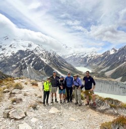 2 Mt Cook guests and guide panorama