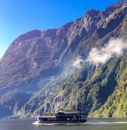 Boating through Milford Sound