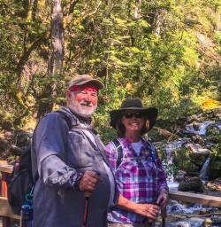 Couple at Bridal Veil Bridge, Routeburn track, Otago New Zealand