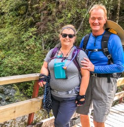 Couple on the bridge at Routeburn track, Otago New Zealand