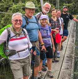 Group on the bridge at Punakaiki River, Paparoa National Park West Coast New Zealand