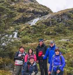 Group at Routeburn Track Falls, Otago New Zealand